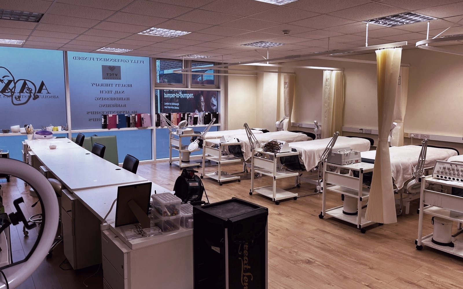 Treatment beds, facial equipment and nail desks in the Feltham beauty and nails training salon