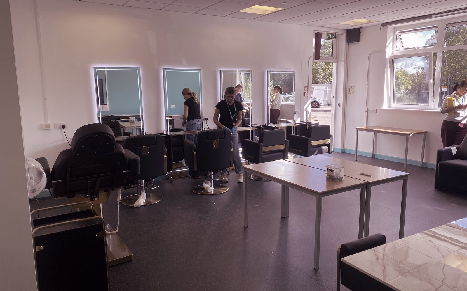The Ealing partnership salon being set up, with styling stations and treatment chair